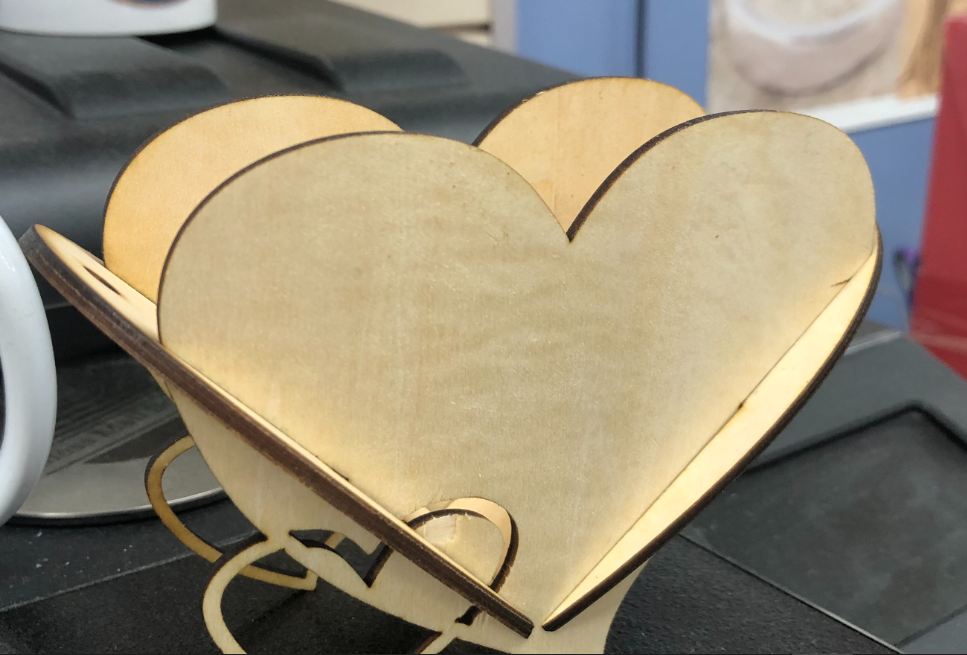 Romantic wooden heart flower holder with roses